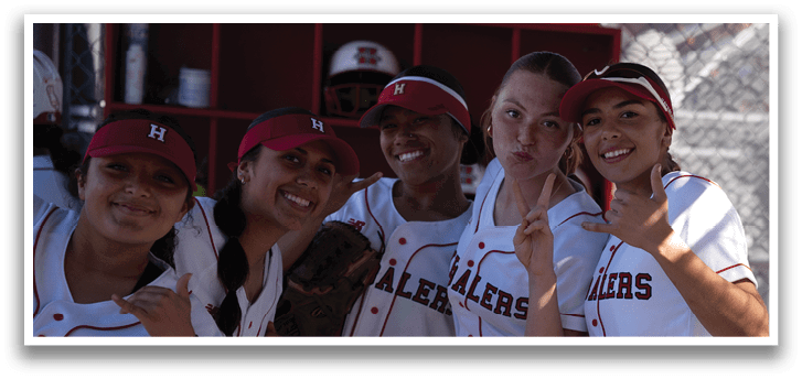 Five female baseball players pose for a photo. AI generated content