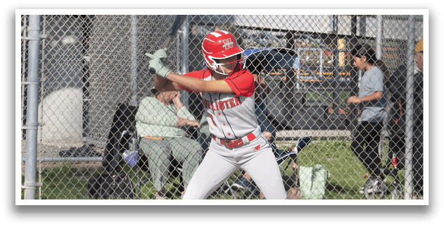 A baseball player in a red and white uniform is swinging a bat. Description generated by AI