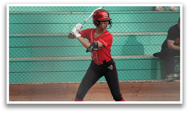 A baseball player is swinging a bat at a ball. Description generated by AI
