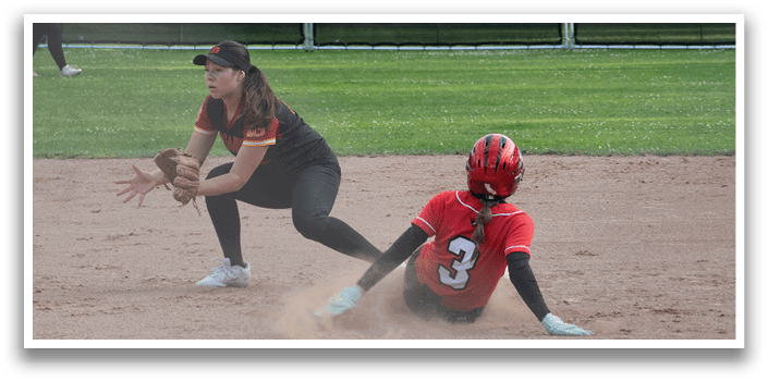 A baseball player slides into home plate. Description generated by AI