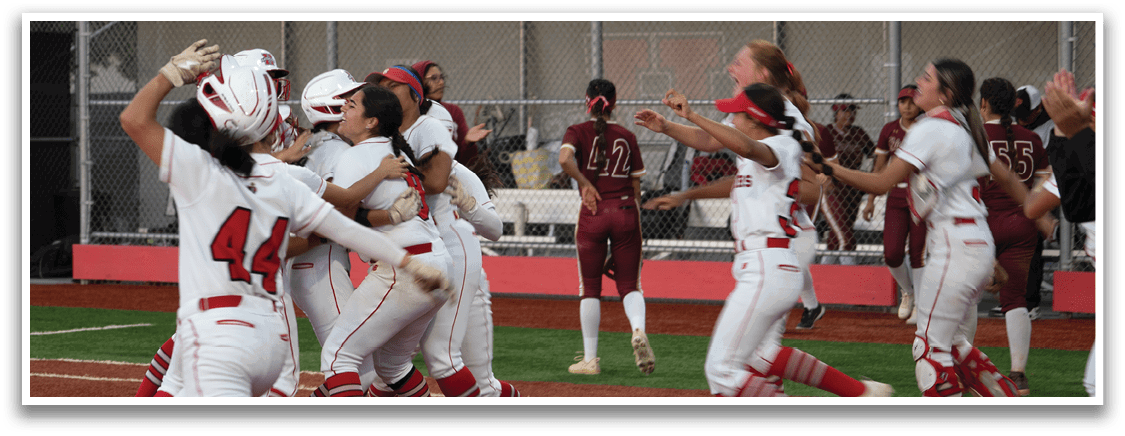 A group of girls celebrating on a baseball field. Description generated by AI