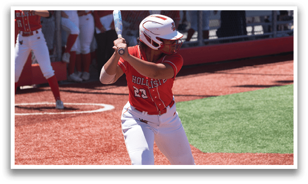 A baseball player is swinging a bat on a field. Description generated by AI