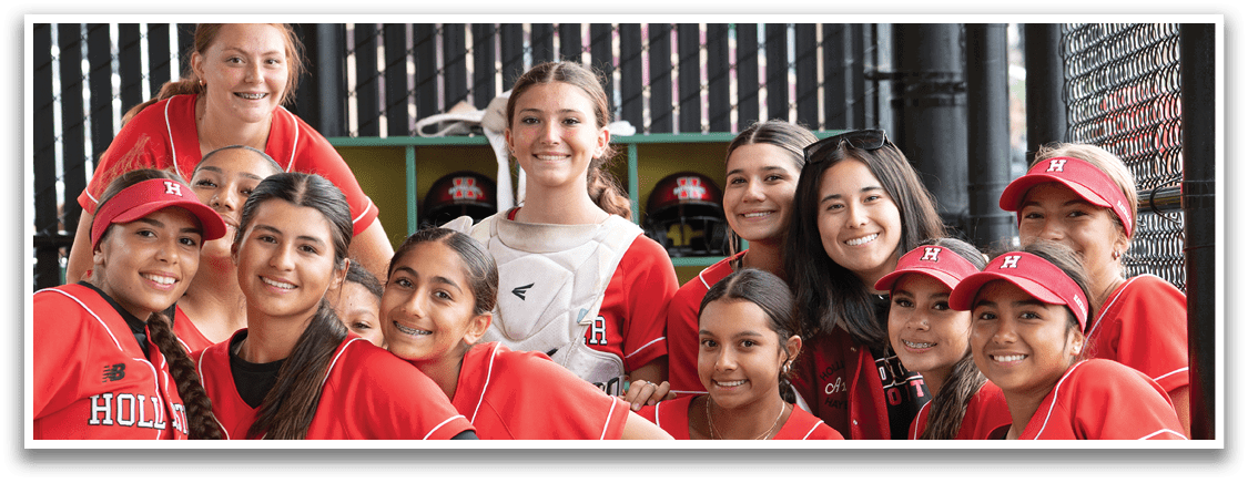 A group of girls wearing red and black uniforms. Description generated by AI