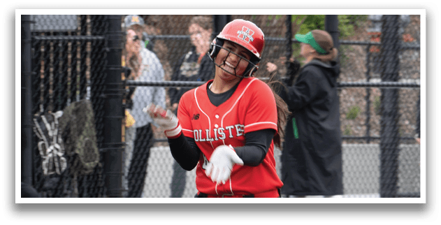 A woman wearing a red shirt and black pants is running on a baseball field. Description generated by AI