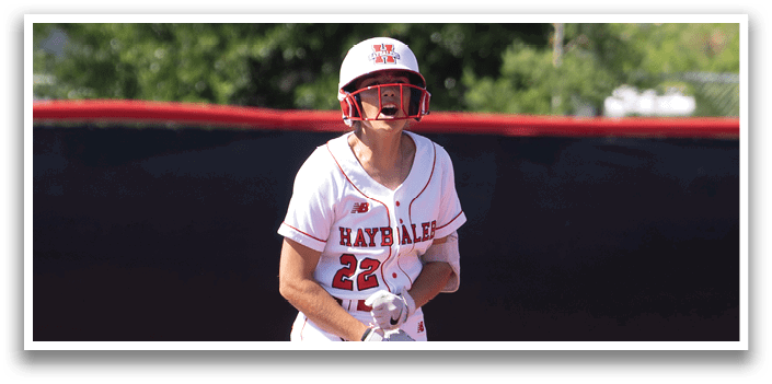 A girl in a red and white uniform is running on a baseball field. Description generated by AI