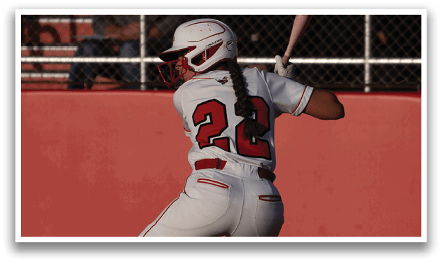 A baseball player is swinging a bat at a ball. Description generated by AI