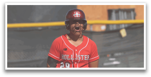 Two female baseball players wearing red and white uniforms. Description generated by AI