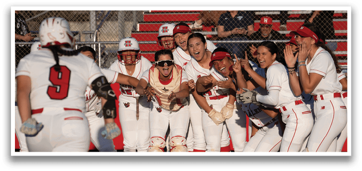 A group of female softball players celebrating on the field. AI generated content