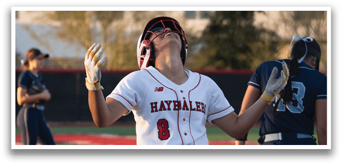 A female baseball player is holding her glove up to the sky, possibly celebrating a play. Another player is standing nearby, and a third player is in the background. AI generated content