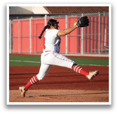 A female baseball player in a white and red uniform is in the process of throwing a ball. AI generated content