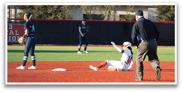 A baseball player is sliding into a base, while another player is standing nearby. AI generated content