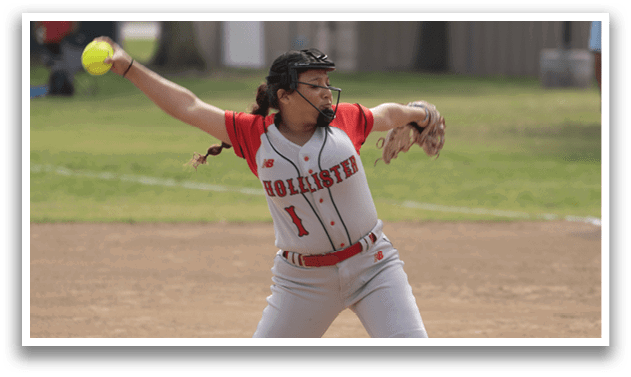 A woman in a red and white uniform is pitching a softball on a field. AI generated content