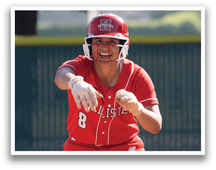 A female baseball player wearing a red shirt and white pants stands on the field. AI generated content