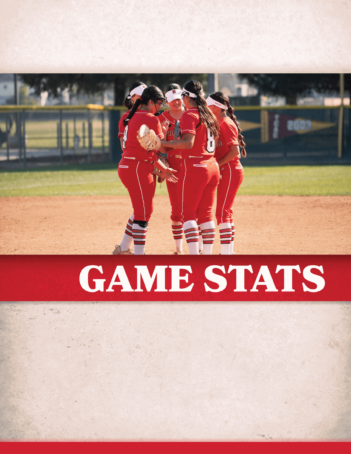 A group of female softball players huddle together on the field. AI generated content