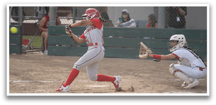 A female baseball player in a red and white uniform is swinging a bat at a ball. AI generated content