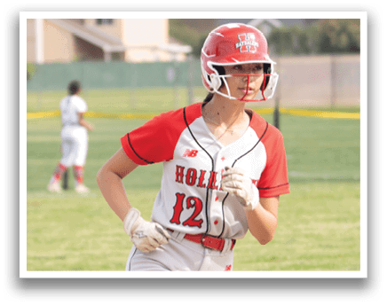 A female baseball player is running towards home plate. AI generated content