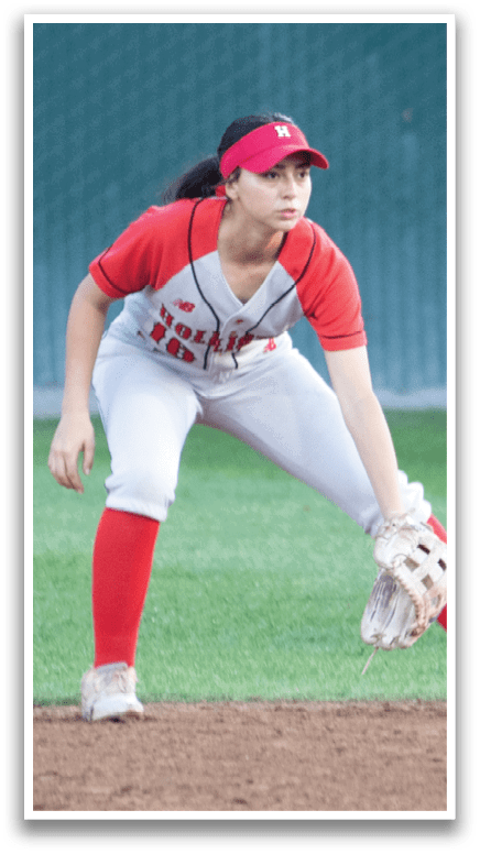 A female baseball player is in the process of throwing a ball. AI generated content