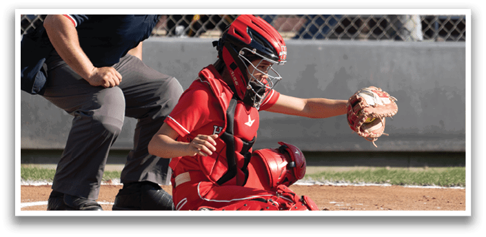 A baseball game is in progress with a batter, catcher, and umpire. The batter is holding a bat and preparing to swing at the ball. The catcher is wearing a baseball glove and is ready to catch the ball. The umpire is standing behind the catcher, closely observing the play. AI generated content