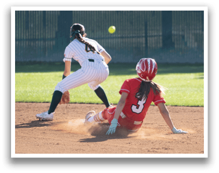 A female baseball player slides into home plate, trying to score a run. AI generated content