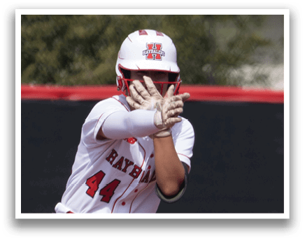 Two female baseball players are standing on the field, one of them holding a bat. The other player is wearing a baseball glove. They are both wearing uniforms and are likely preparing for a game. AI generated content