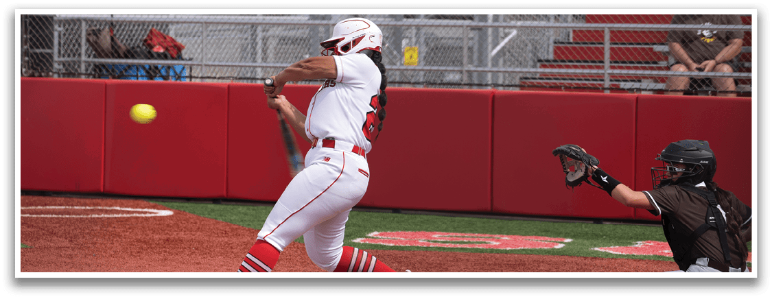 A female baseball player is swinging her bat at a ball. AI generated content