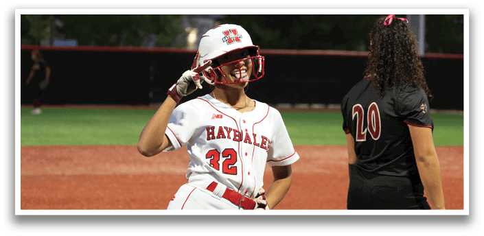Two female baseball players on a field, one wearing a red and white uniform and the other wearing a black uniform. AI generated content