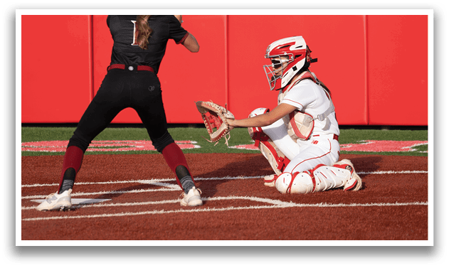 A female baseball player is swinging a bat at a ball, while a catcher and an umpire watch. AI generated content