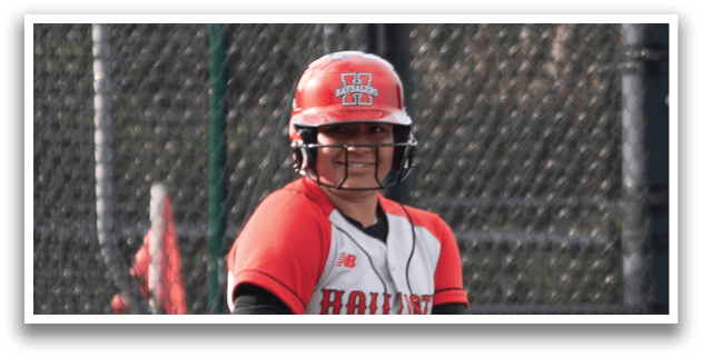 A baseball game is taking place with a group of people on the field. Description generated by AI