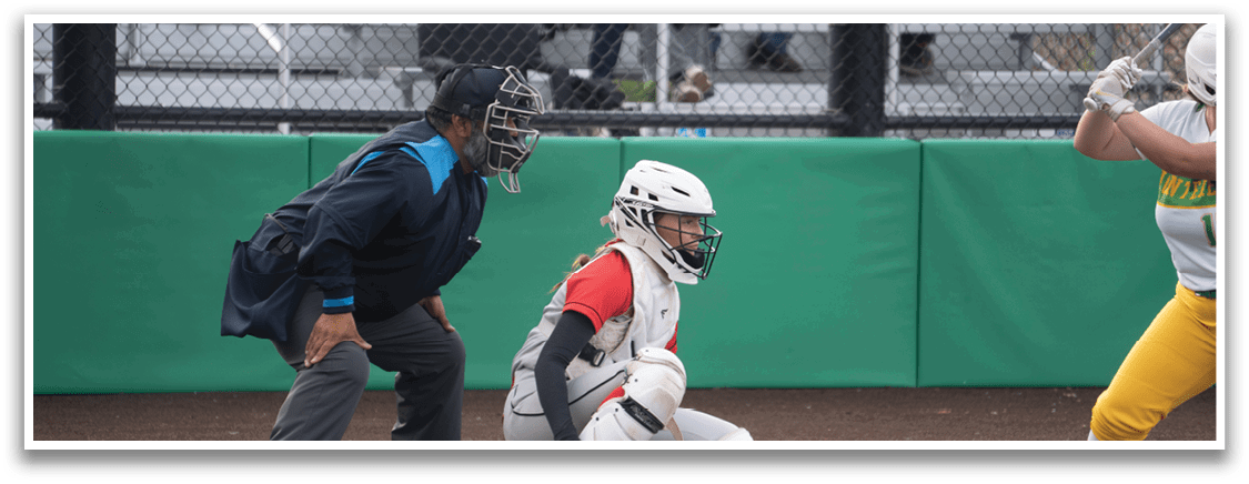 A baseball player is swinging a bat at a ball. Description generated by AI