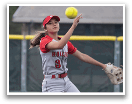A girl catching a ball. Description generated by AI