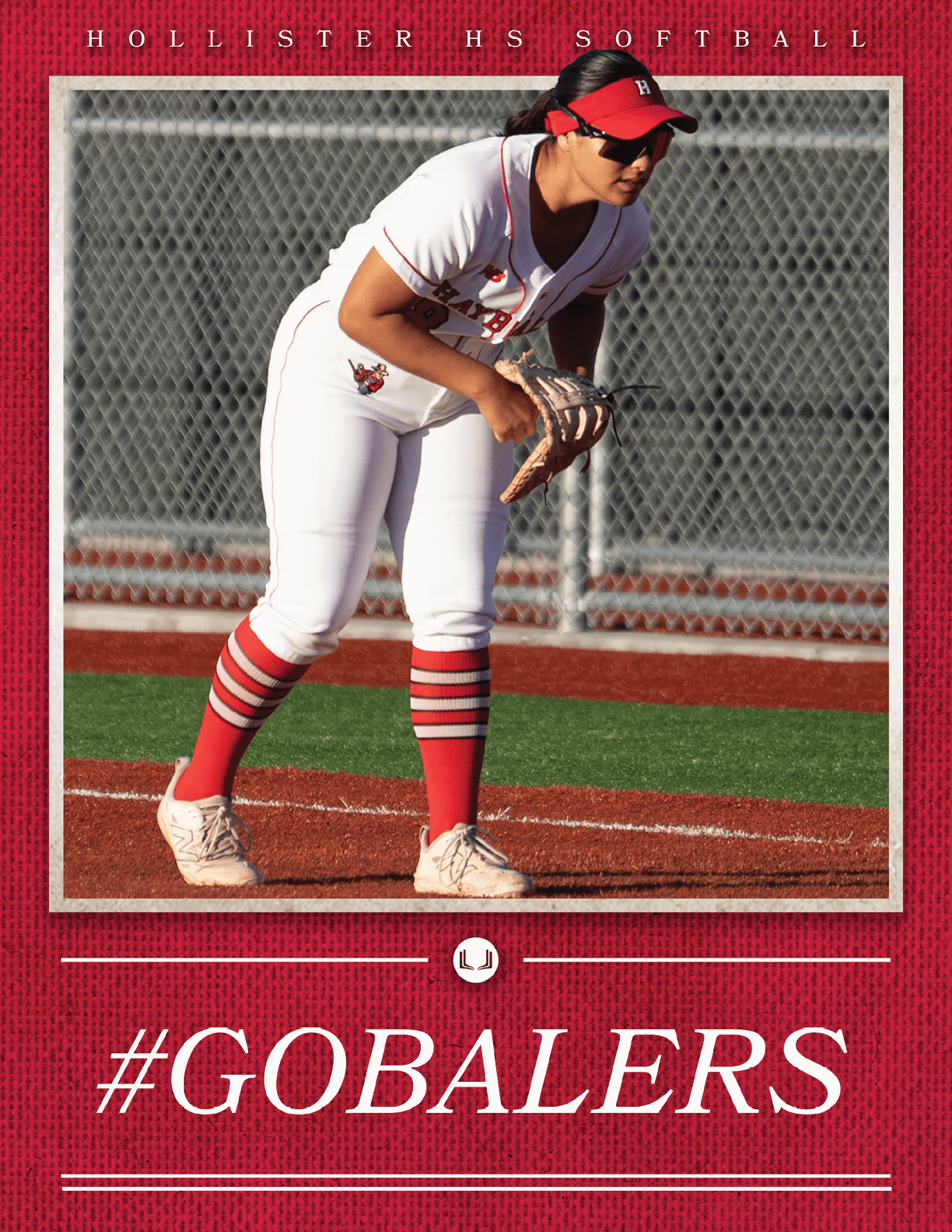 A female softball player wearing a red and white uniform. Description generated by AI