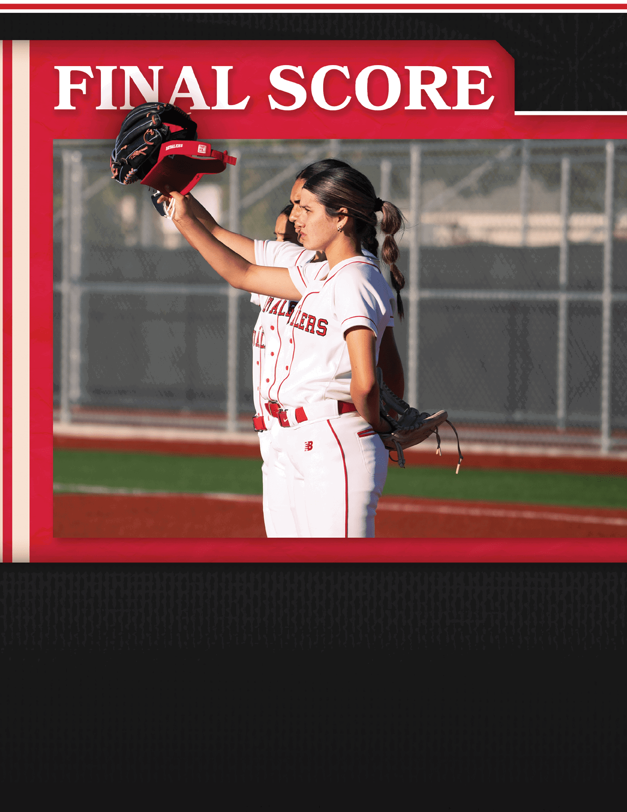 A girl wearing a red and white uniform. Description generated by AI