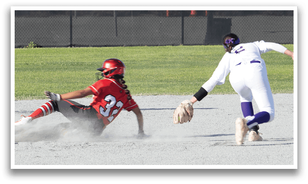 A baseball player slides into a base. Description generated by AI