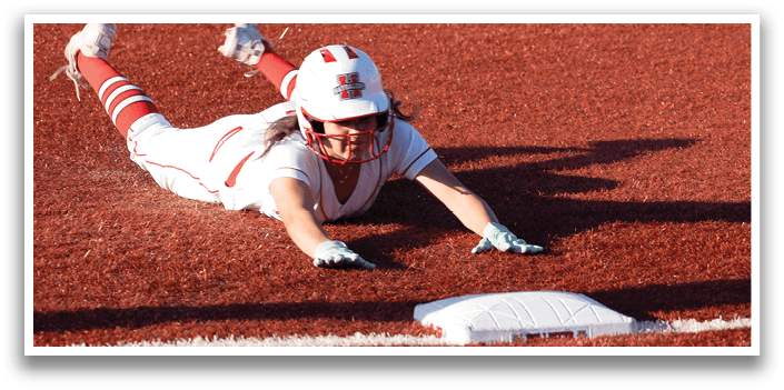 A baseball player sliding into a base. Description generated by AI