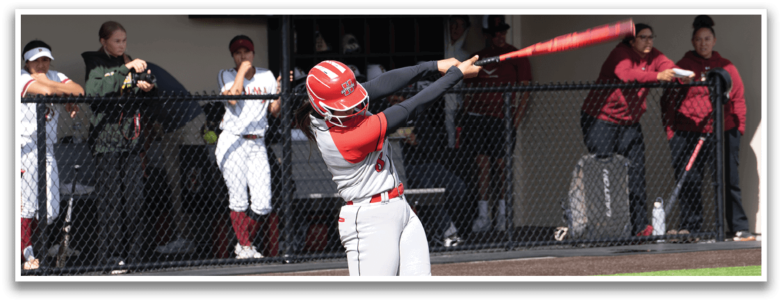 A baseball player is swinging a bat at a ball. Description generated by AI