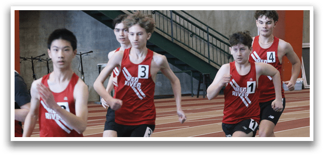 Four young men wearing red and black uniforms are running on a track. AI generated content