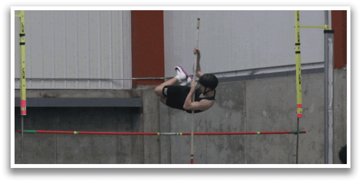 A woman is jumping in the air on a trampoline, wearing a black shirt. AI generated content