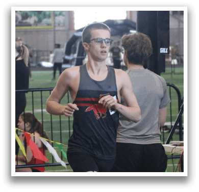 A man is running on a track while a woman stands behind him. AI generated content