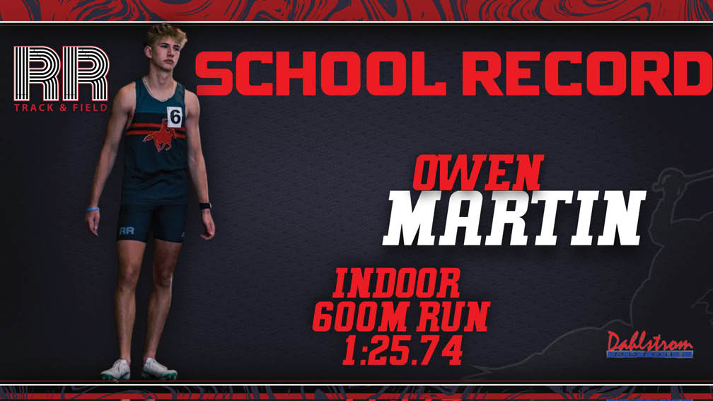 A man wearing a black and red shirt stands in front of a sign that says “School Record" and "Owen Martin". AI generated content