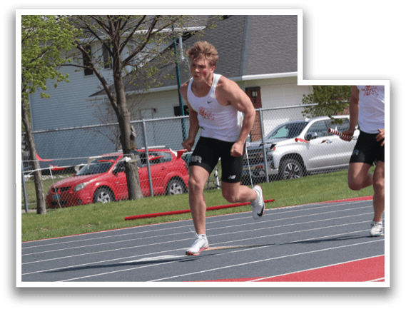 A man running on a track. Description generated by AI
