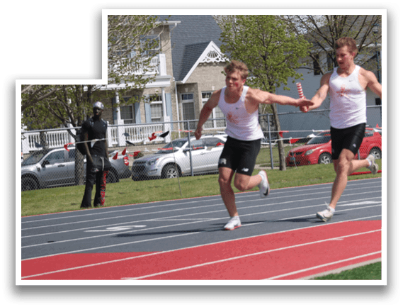 Two men running on a track. Description generated by AI