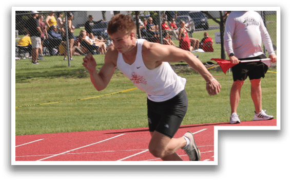 Three men running on a track. Description generated by AI