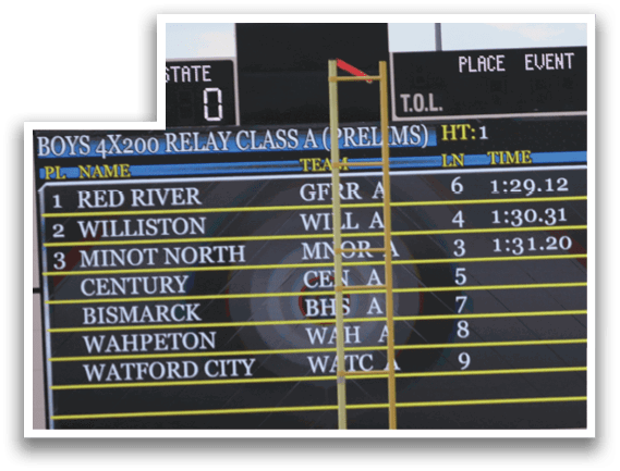 A large group of people are standing on a field in front of a scoreboard. Description generated by AI