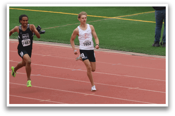 A group of people are running on a track. Description generated by AI