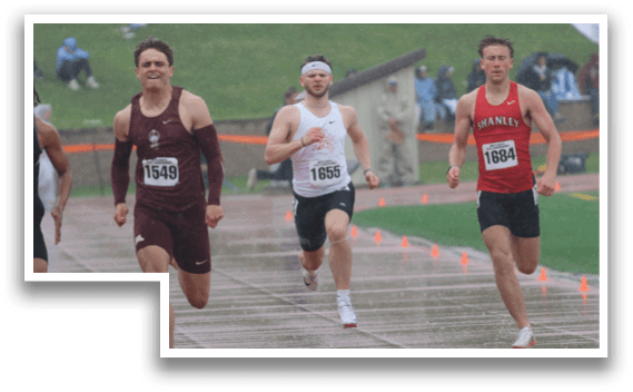 A group of runners on a track. Description generated by AI