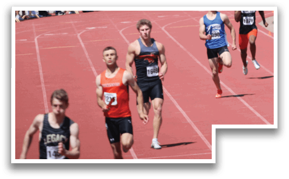A group of runners on a track. Description generated by AI