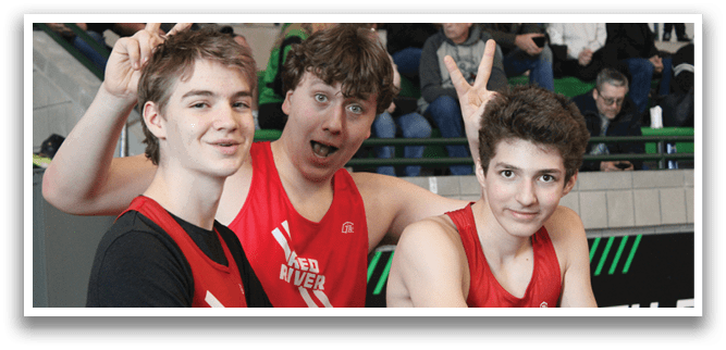 Three young men wearing red shirts and posing for a picture. AI generated content