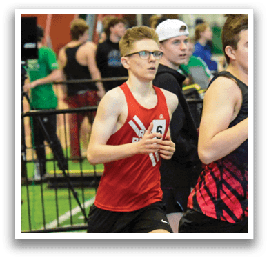 A group of young men are running on a track, wearing numbers on their shirts. AI generated content