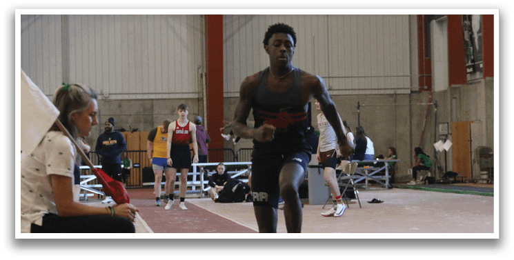A man is running on a track while a woman watches. AI generated content