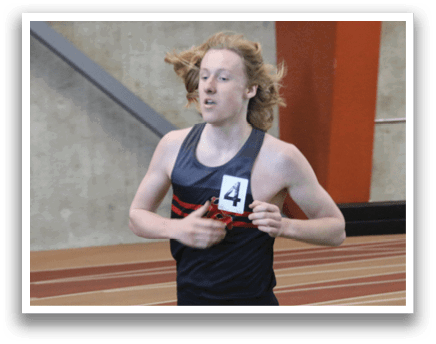A runner wearing a black shirt and shorts with the number 4 on it is running on a track. AI generated content
